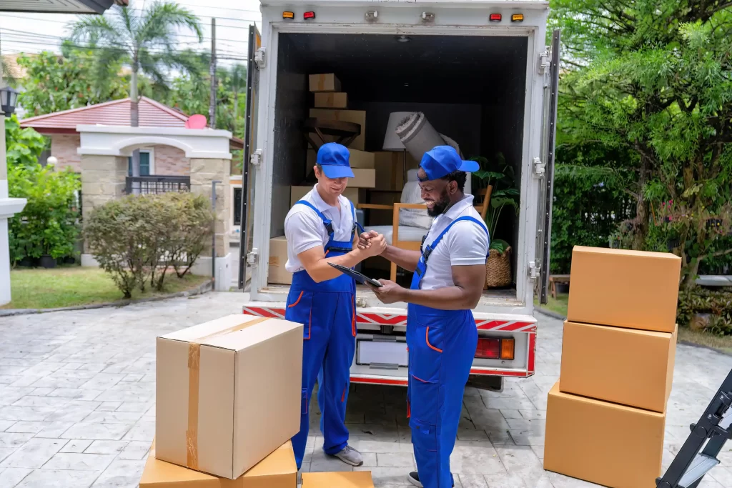 Our long distance movers in lauderhill fl team loading furniture truck for a long-distance move.